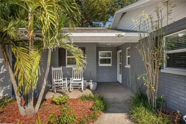 a view of outdoor chair and table in the patio