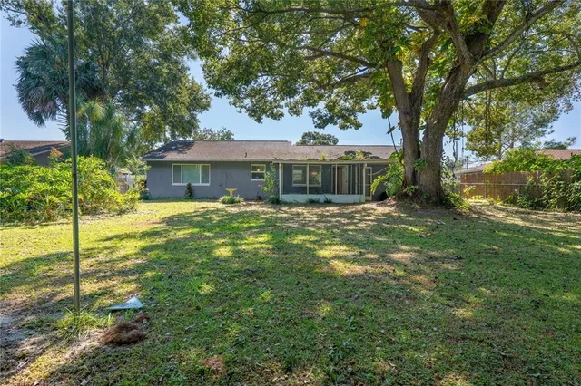 a view of a house with a big yard