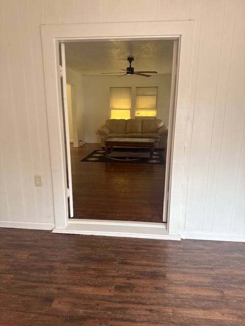 4517 Hirsch Road Houston, TX 77026 - Photo 2 of 11 a view of a living room with wooden floor and a fireplace