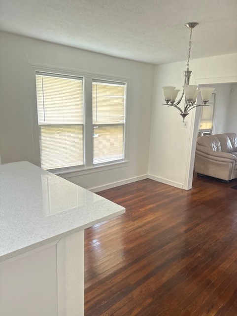 4517 Hirsch Road Houston, TX 77026 - Photo 4 of 11 a view of empty room with wooden floor and window