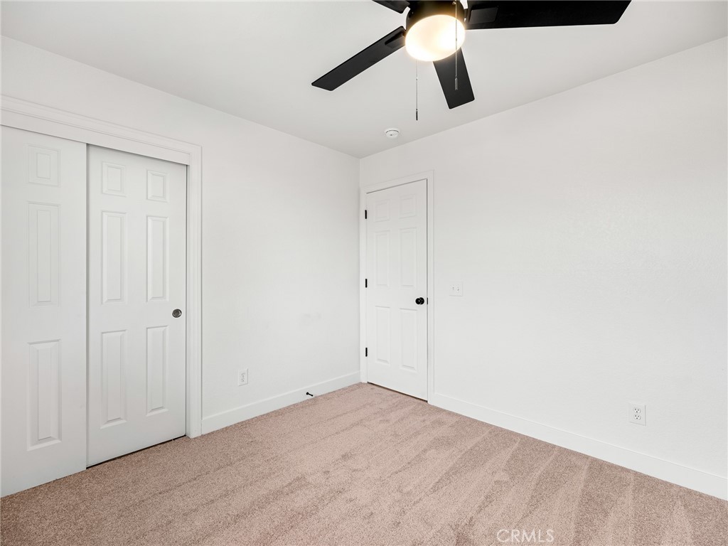 12780 Hacienda Road Phelan, CA 92371 - Photo 24 of 38 a view of an empty room