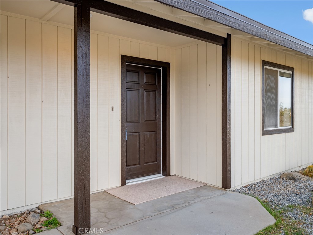 12780 Hacienda Road Phelan, CA 92371 - Photo 3 of 38 a view of bedroom and hallway