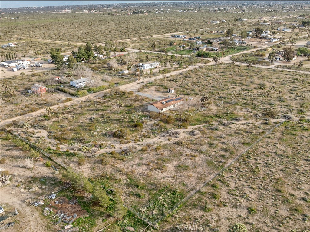 12780 Hacienda Road Phelan, CA 92371 - Photo 37 of 38 an aerial view of residential houses with outdoor space