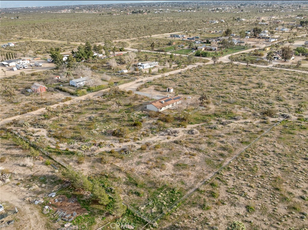 12780 Hacienda Road Phelan, CA 92371 - Photo 37 of 38 an aerial view of residential houses with outdoor space
