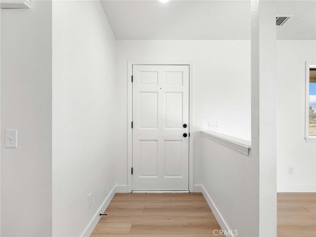 12780 Hacienda Road Phelan, CA 92371 - Photo 4 of 38 a view of an empty room