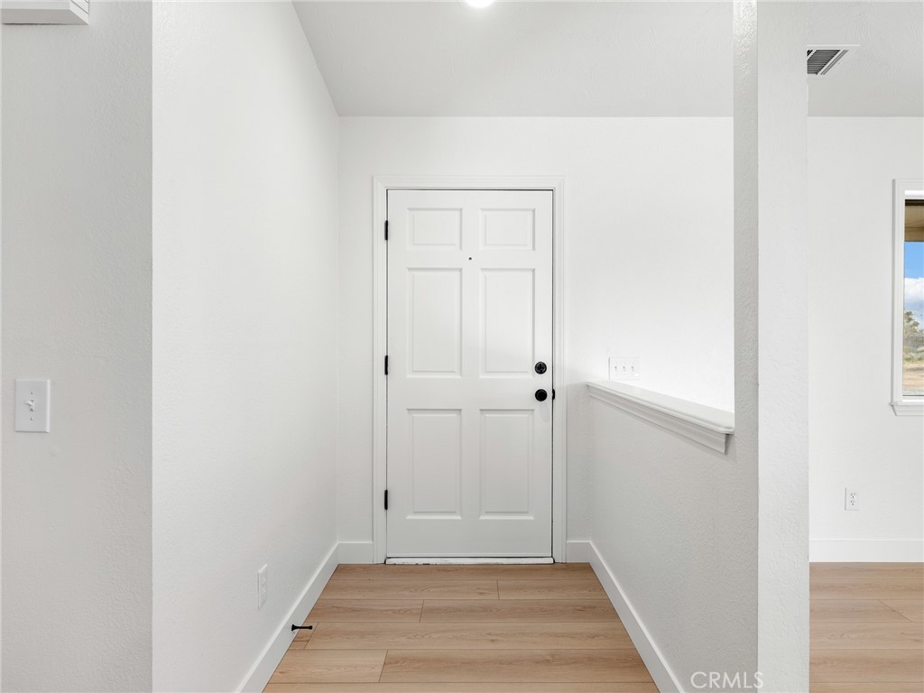 12780 Hacienda Road Phelan, CA 92371 - Photo 4 of 38 a view of an empty room