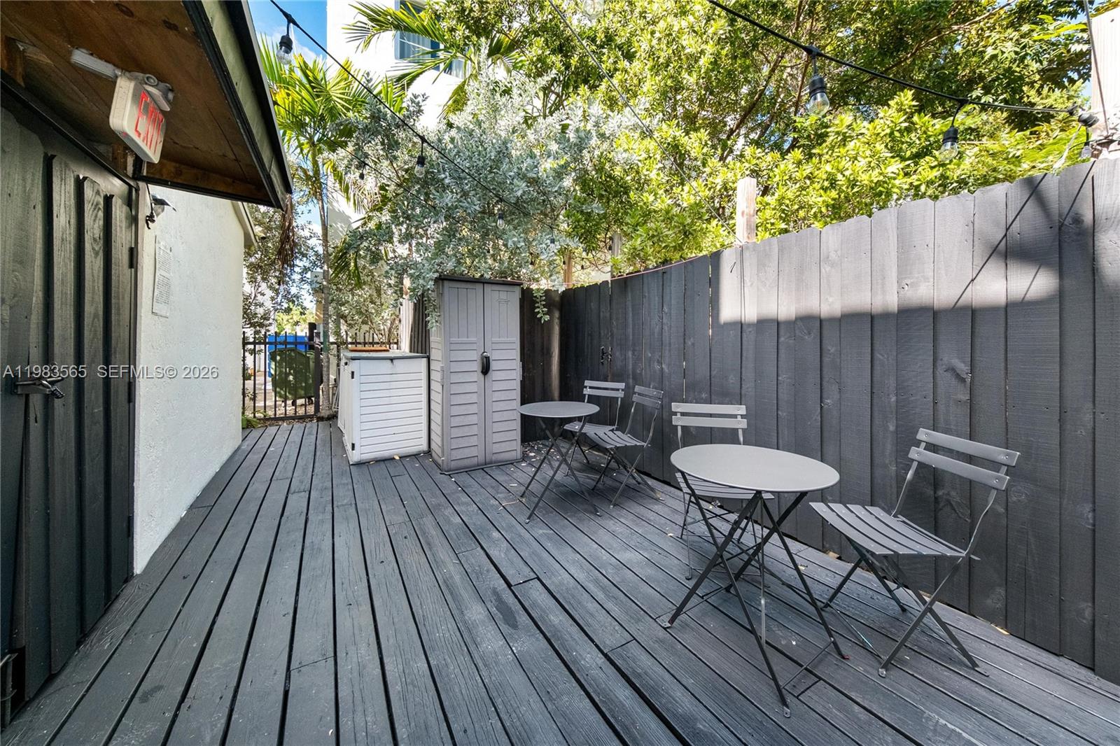 237 38th Street, Unit 4 Miami Beach, FL 33140 - Photo 15 of 28 a view of couches on the deck