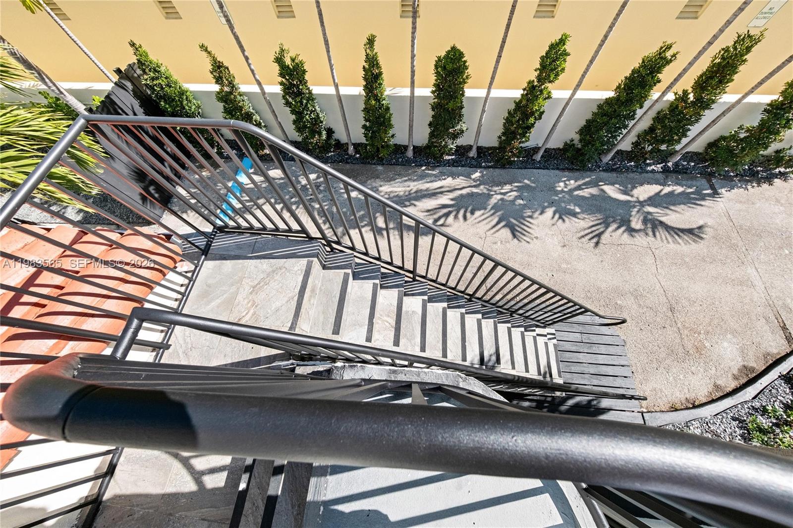 237 38th Street, Unit 4 Miami Beach, FL 33140 - Photo 17 of 28 a view of building with view of car parked