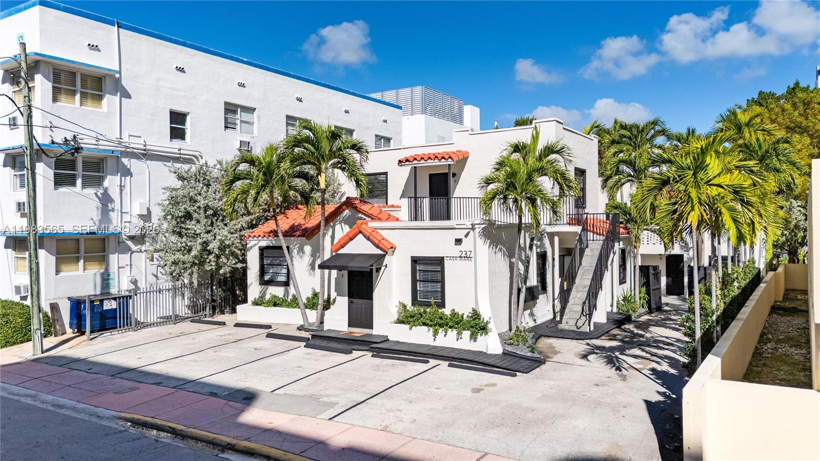 237 38th Street, Unit 4 Miami Beach, FL 33140 - Photo 3 of 28 a view of a building with a street