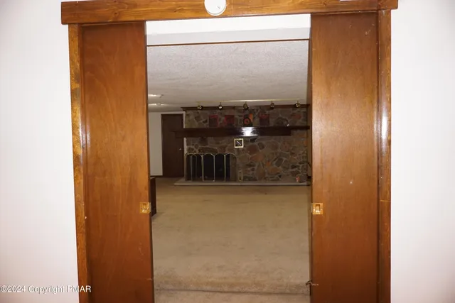 a view of a yard with basketball court