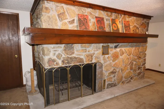 a spacious bedroom with a bed and a closet