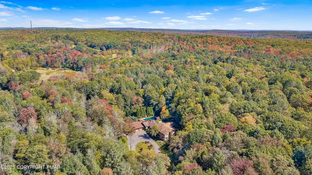 a bed room with furniture and a window