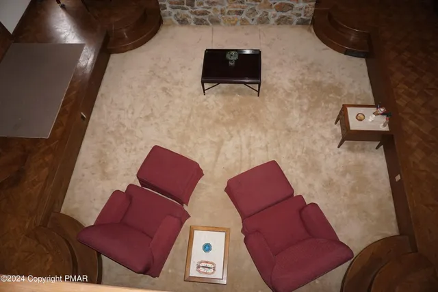 a bathroom with a double vanity sink a mirror and a shower