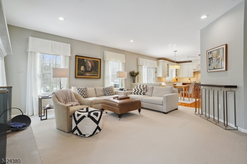 13 O'Brien Court Bedminster, NJ 07921 - Photo 7 of 50 a living room with furniture and a flat screen tv