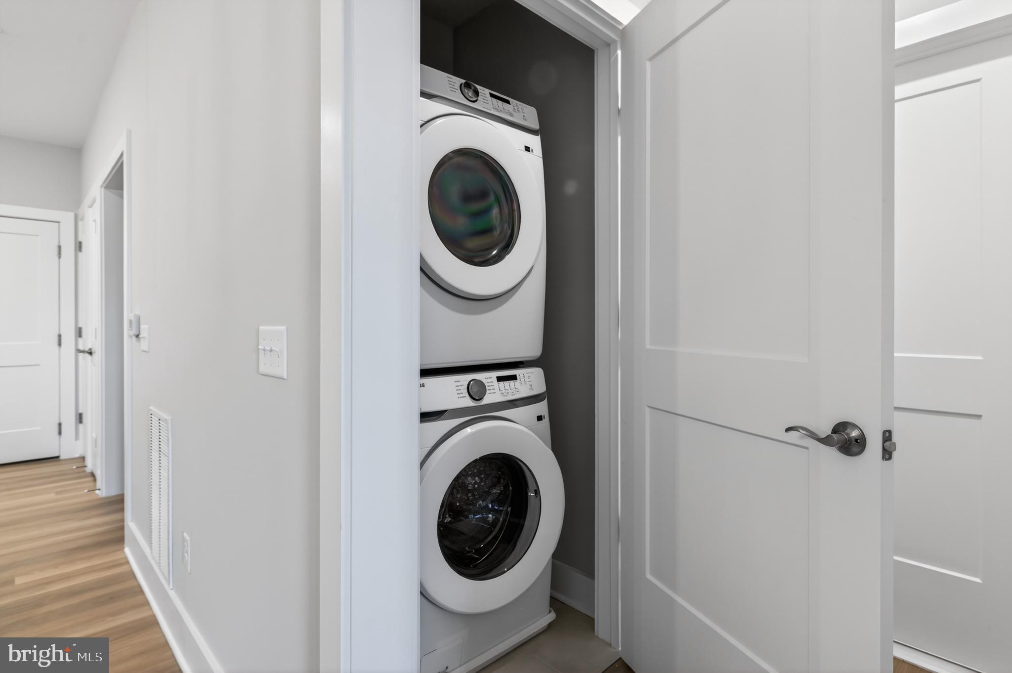 76 Old Mill Bottom Road North, Unit 203 Annapolis, MD 21409 - Photo 19 of 50 a view of a hallway with washer and dryer