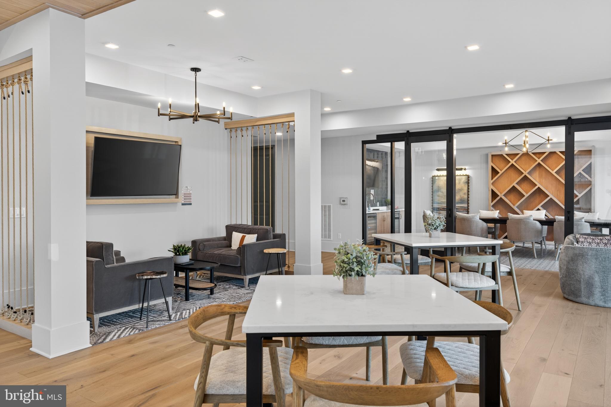 76 Old Mill Bottom Road North, Unit 203 Annapolis, MD 21409 - Photo 28 of 50 a view of a a dining room with furniture window and wooden floor