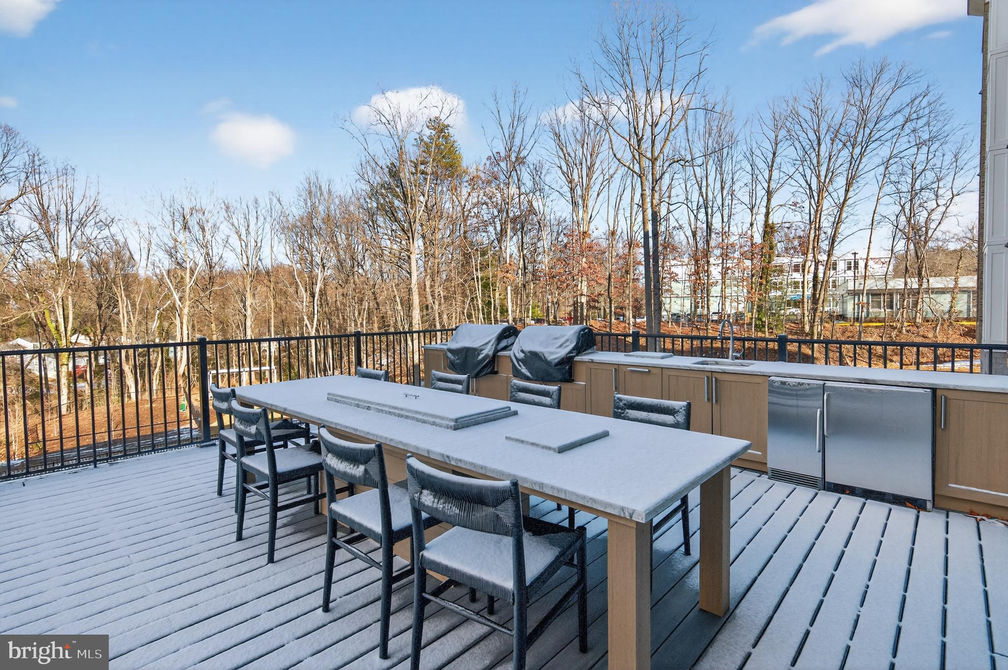 76 Old Mill Bottom Road North, Unit 203 Annapolis, MD 21409 - Photo 34 of 50 a view of a terrace with furniture and wooden floor