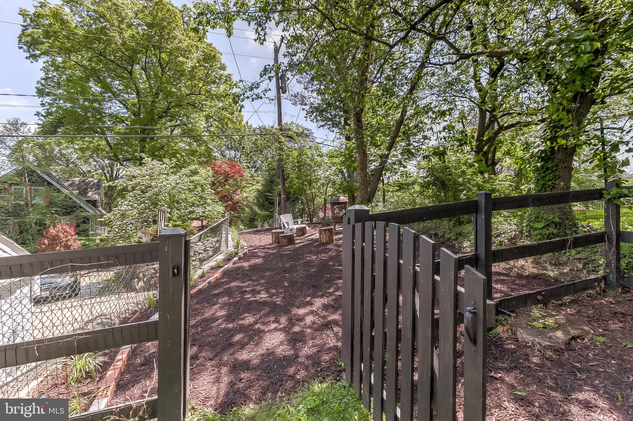 5707 Ridgedale Road Baltimore, MD 21209 - Photo 49 of 56 Yard Extends Beyond the Fence