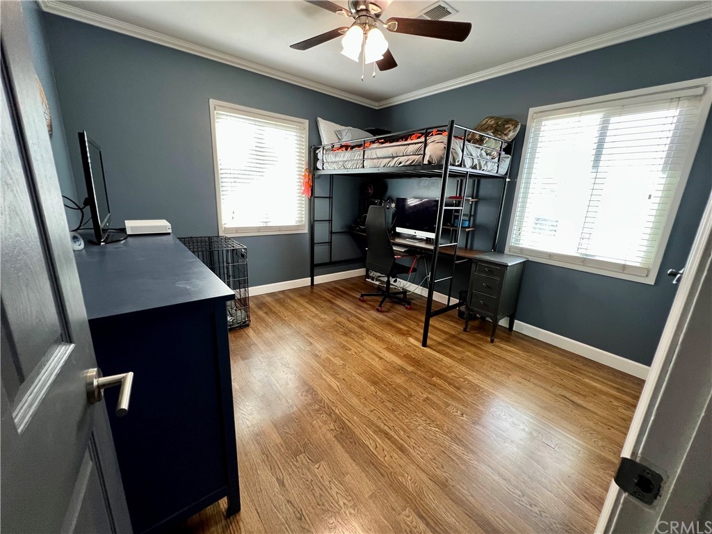 3713 North Studebaker Road Long Beach, CA 90808 - Photo 2 of 15 a view of a workspace with furniture and a window