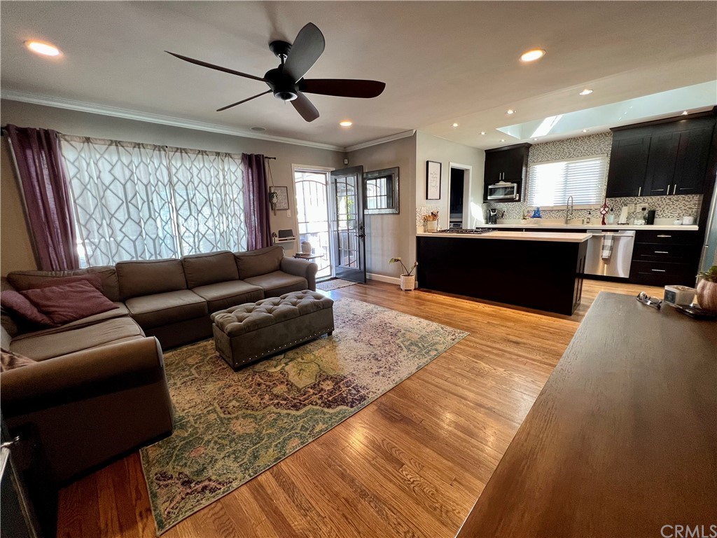 3713 North Studebaker Road Long Beach, CA 90808 - Photo 4 of 15 a living room with furniture and kitchen view