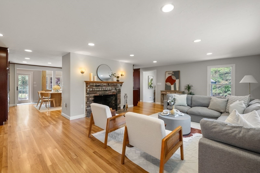 49 Walpole Street Dover, MA 02030 - Photo 12 of 40 a living room with furniture and a fireplace
