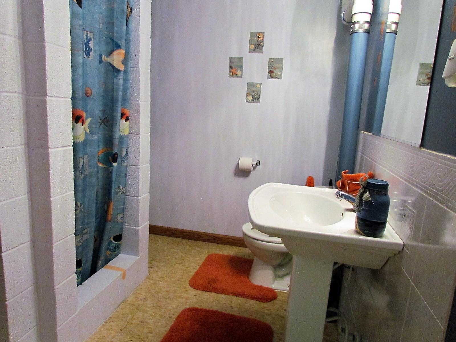81 Jamison Mill Road Henry, VA 24102 - Photo 21 of 28 a bathroom with a sink toilet and shower