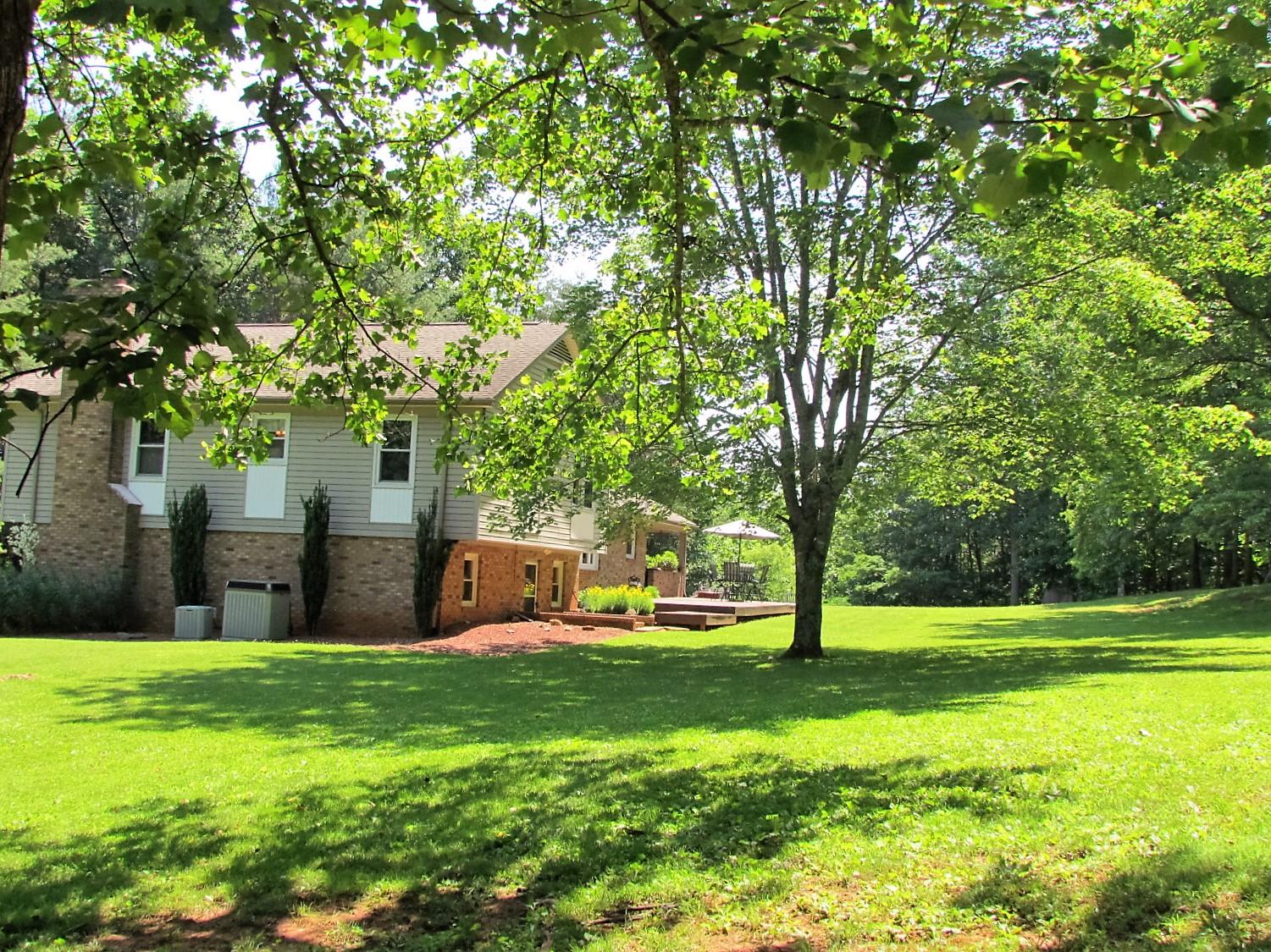 81 Jamison Mill Road Henry, VA 24102 - Photo 25 of 28 a front view of a house with garden