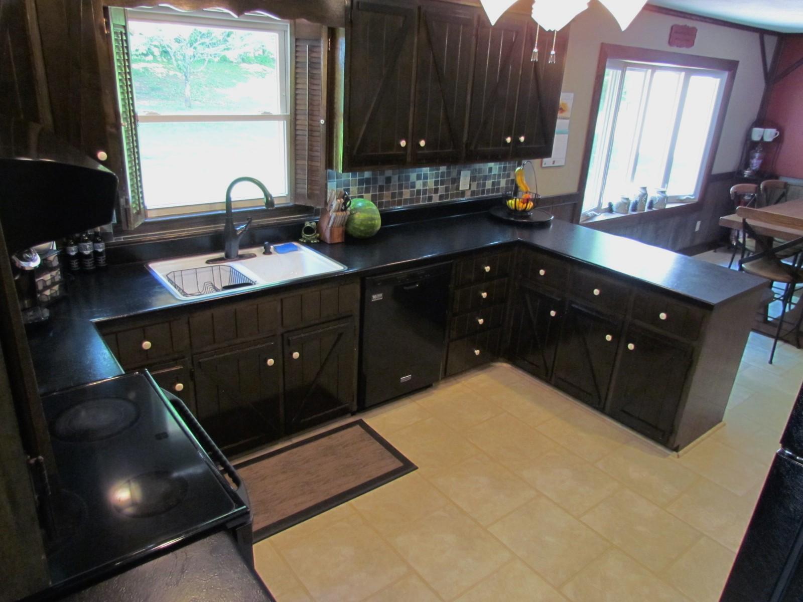 81 Jamison Mill Road Henry, VA 24102 - Photo 5 of 28 a kitchen with a sink and a cabinets