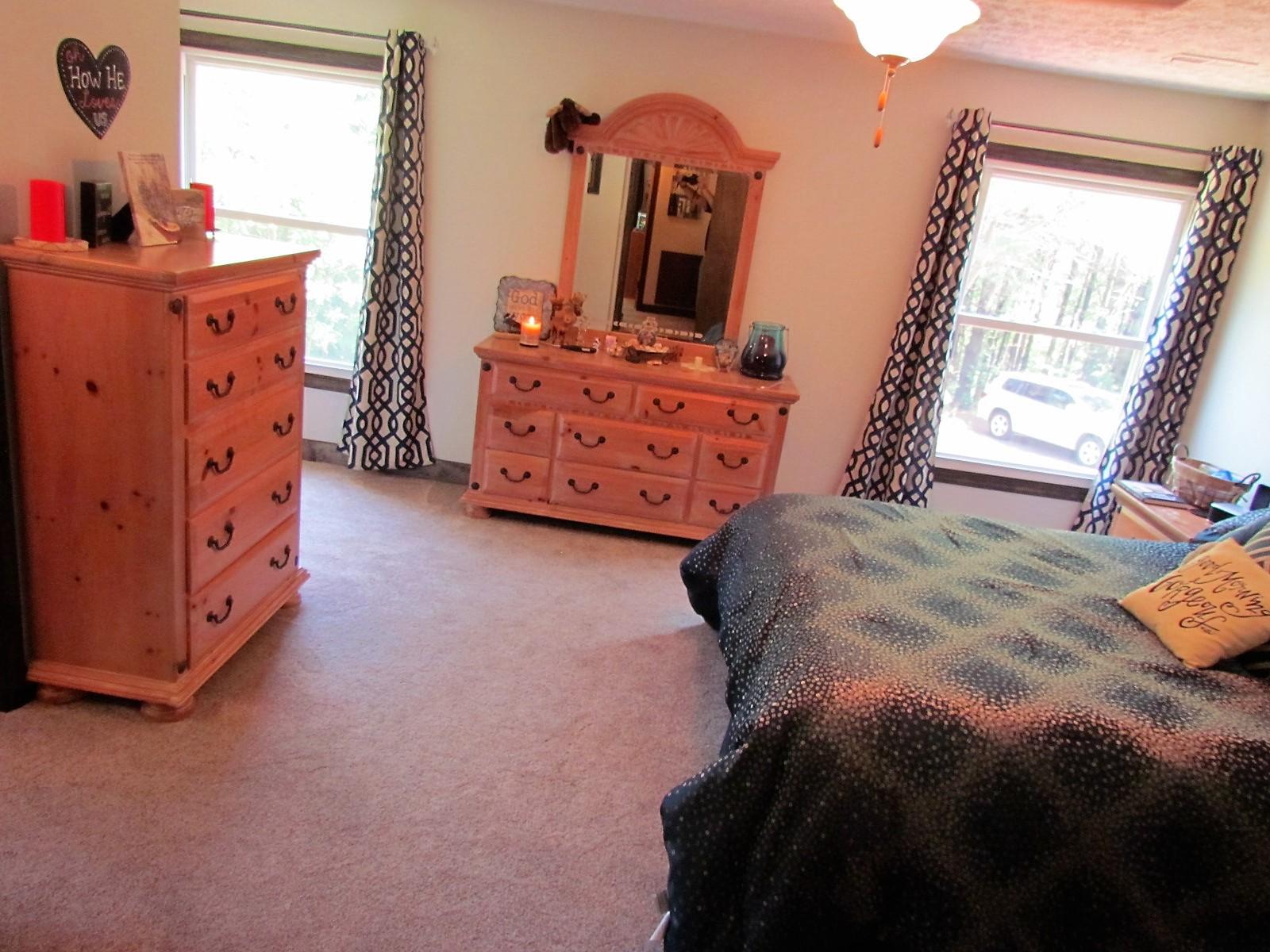 81 Jamison Mill Road Henry, VA 24102 - Photo 9 of 28 a bedroom with a bed and a dresser in it