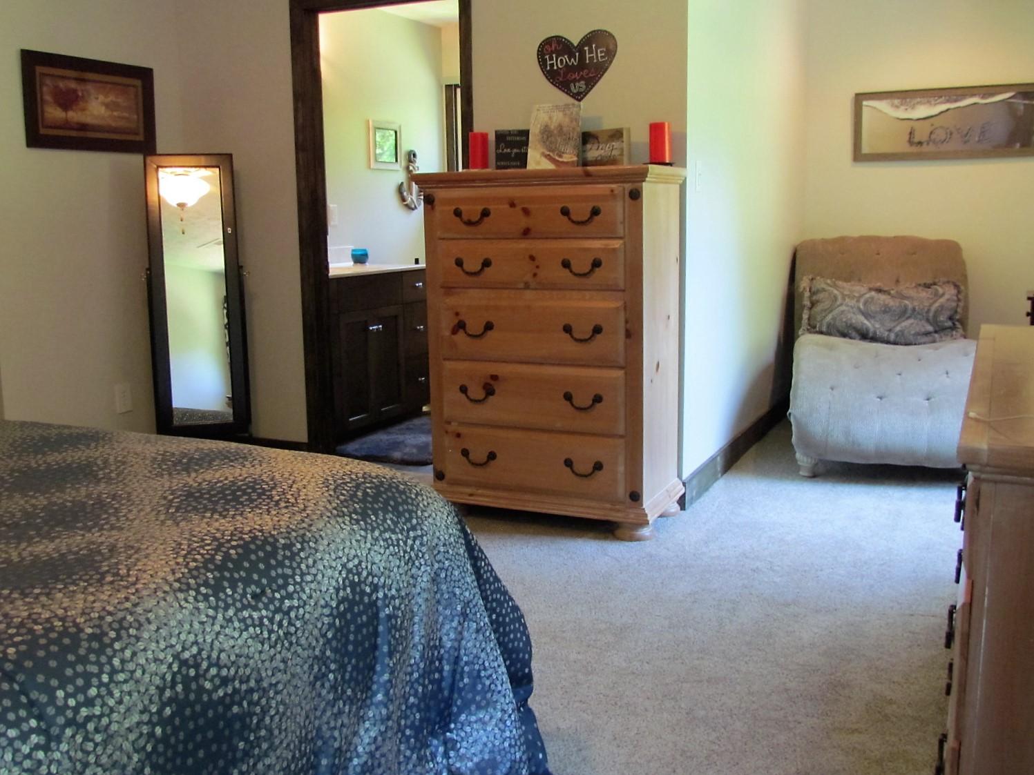 81 Jamison Mill Road Henry, VA 24102 - Photo 10 of 28 a bedroom with a bed and a dresser