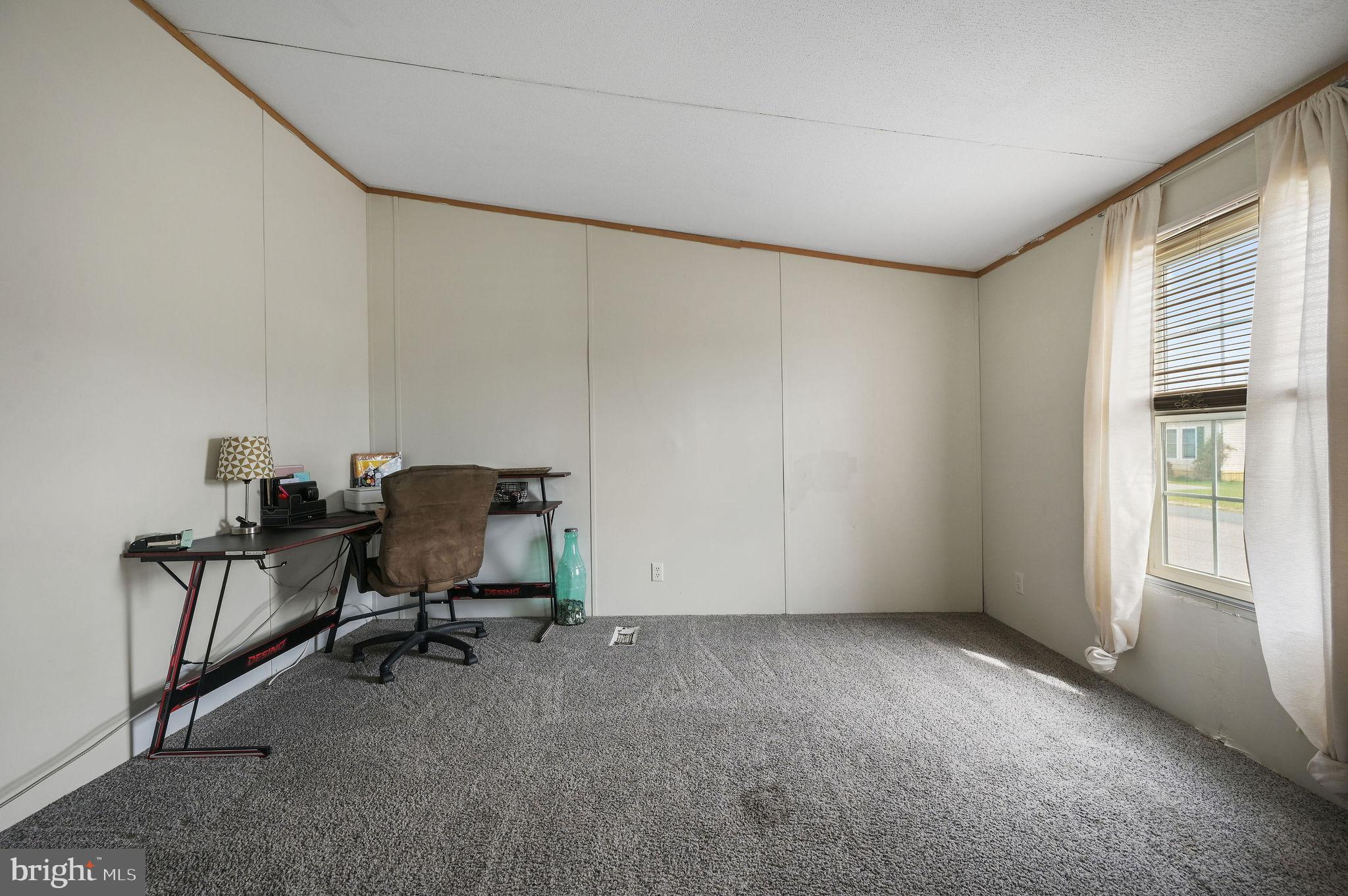 158 Caveat Road, Unit 200 Magnolia, DE 19962 - Photo 11 of 17 a view of workspace with windows