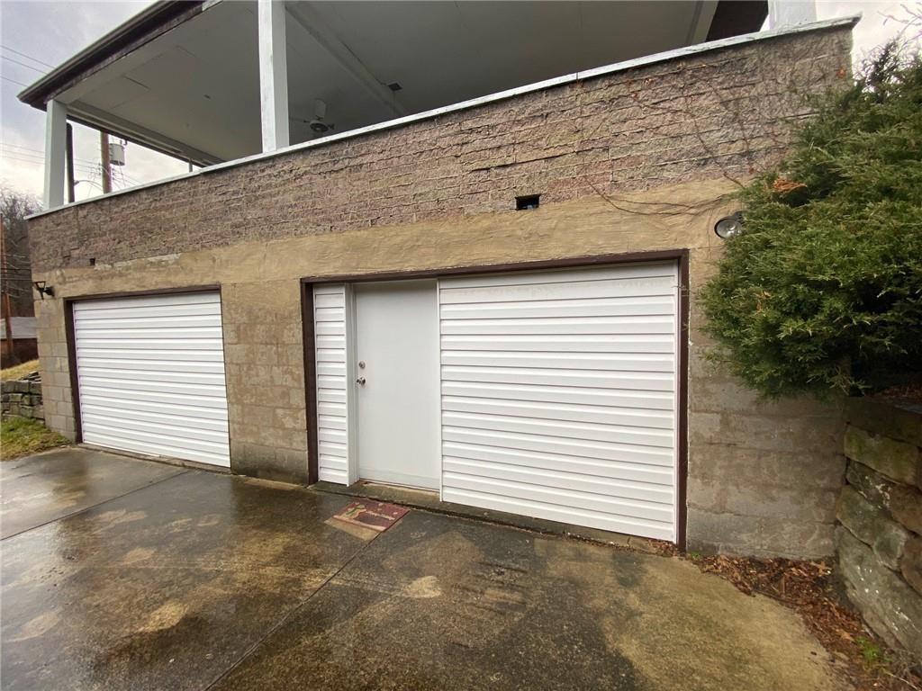 409 Rodi Road Pittsburgh, PA 15235 - Photo 2 of 22 a view of a front door and a yard
