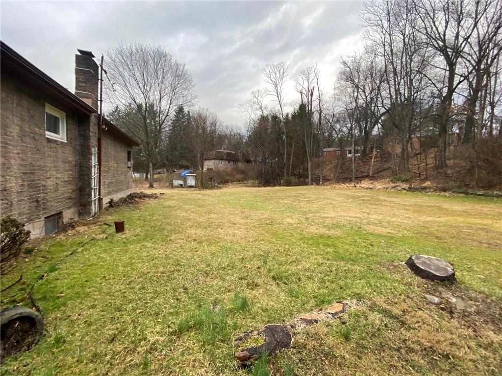 409 Rodi Road Pittsburgh, PA 15235 - Photo 4 of 22 a view of a yard with an trees