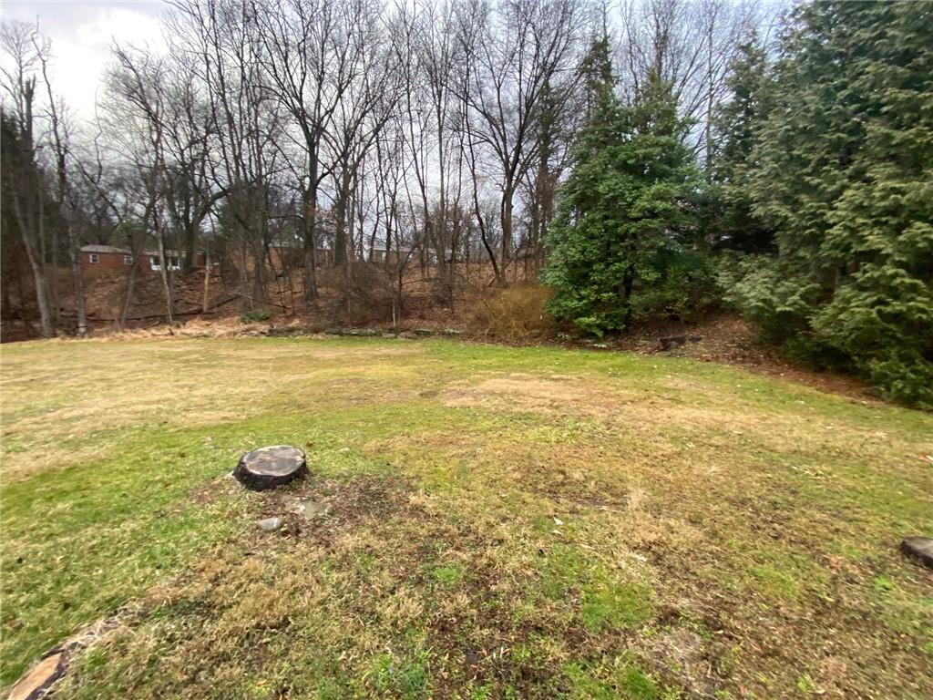 409 Rodi Road Pittsburgh, PA 15235 - Photo 5 of 22 a view of a pool with a yard