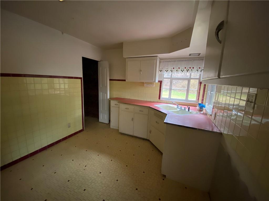 409 Rodi Road Pittsburgh, PA 15235 - Photo 6 of 22 a view of a kitchen with a sink