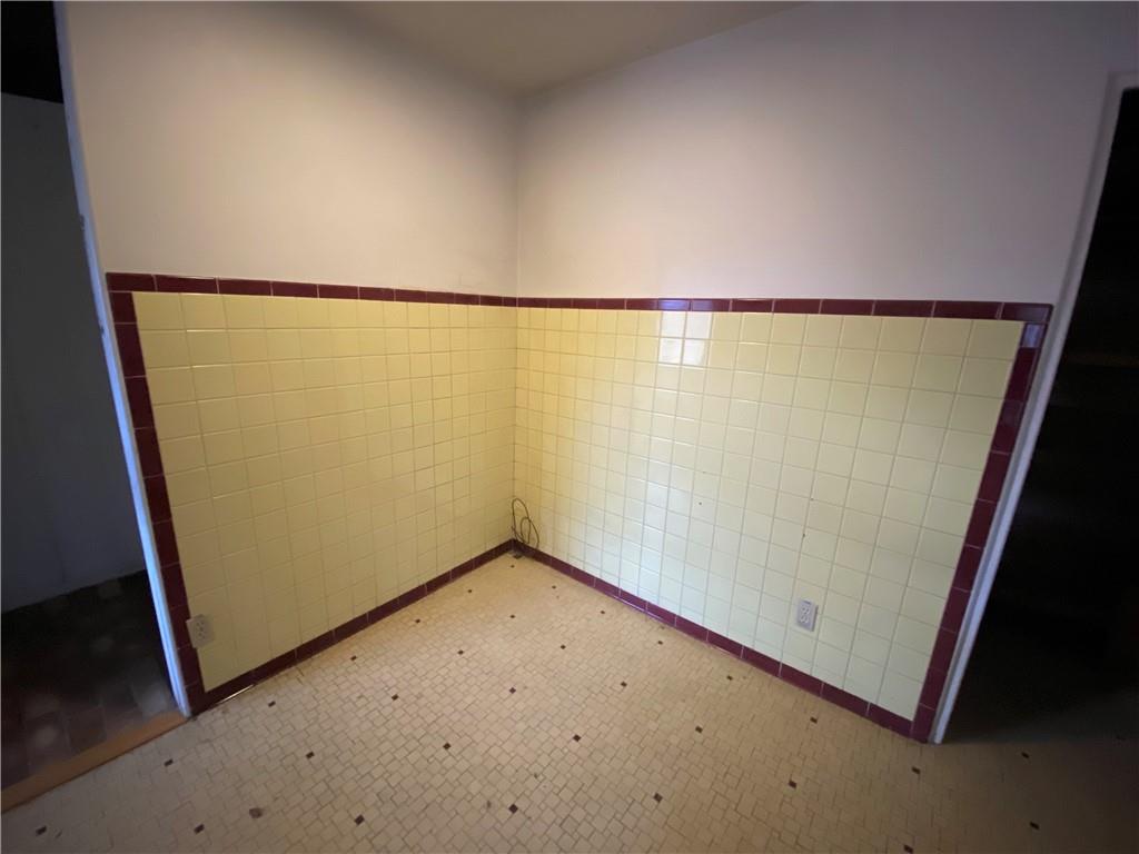 409 Rodi Road Pittsburgh, PA 15235 - Photo 8 of 22 a view of a room with an empty door