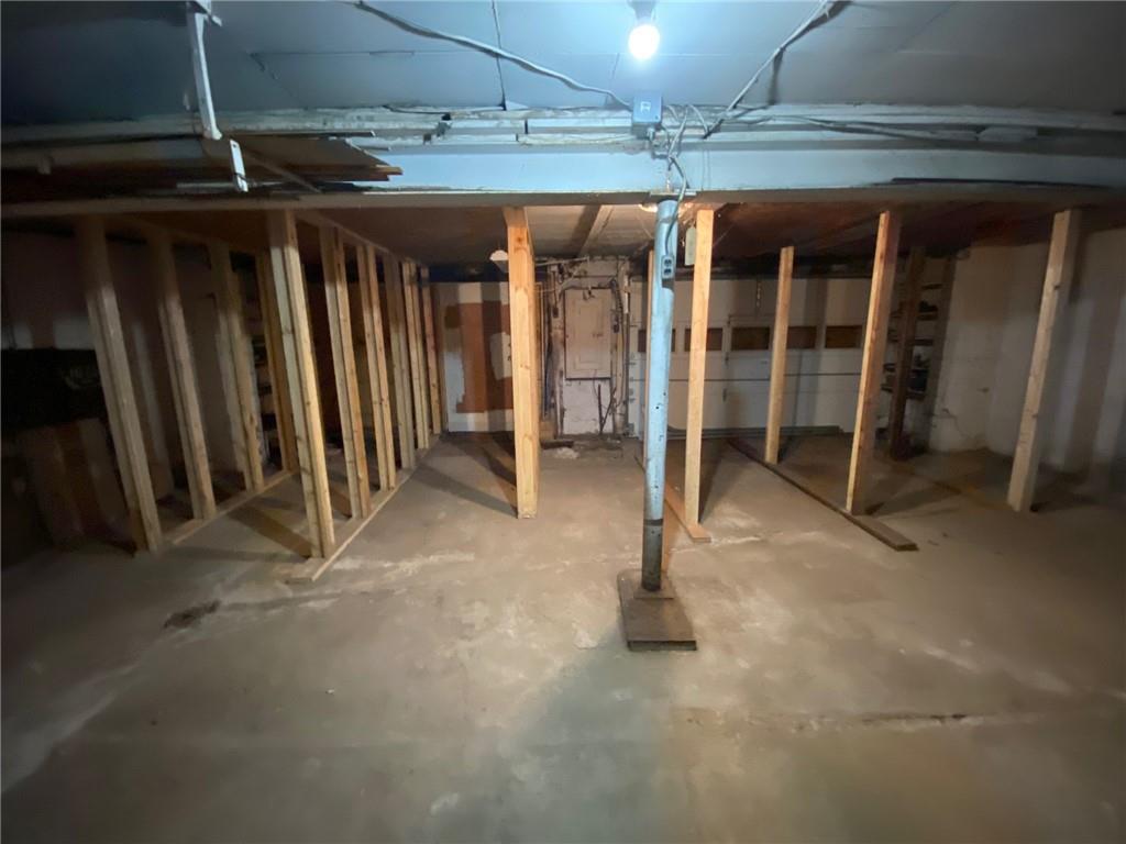 409 Rodi Road Pittsburgh, PA 15235 - Photo 10 of 22 a view of an empty room with wooden roof