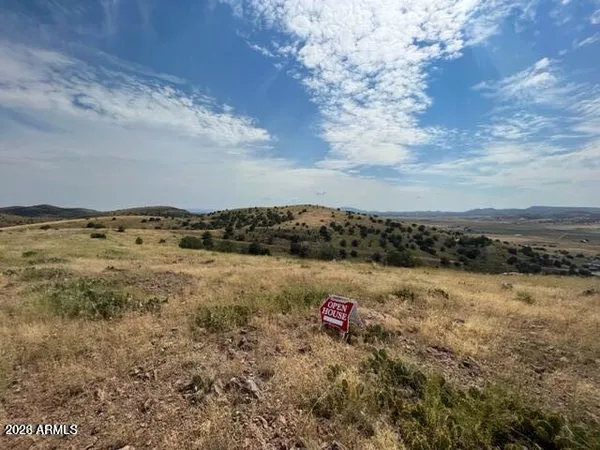 a view of a lake with mountains in the background