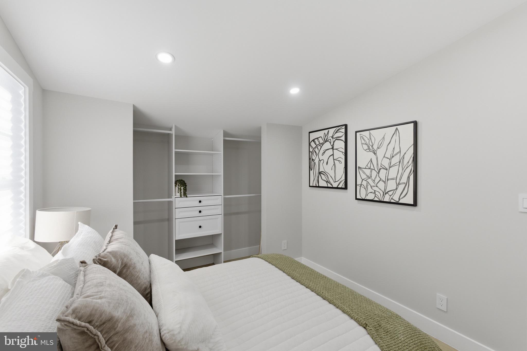5218 Nick Road Shady Side, MD 20764 - Photo 18 of 24 a bedroom with a bed and furniture