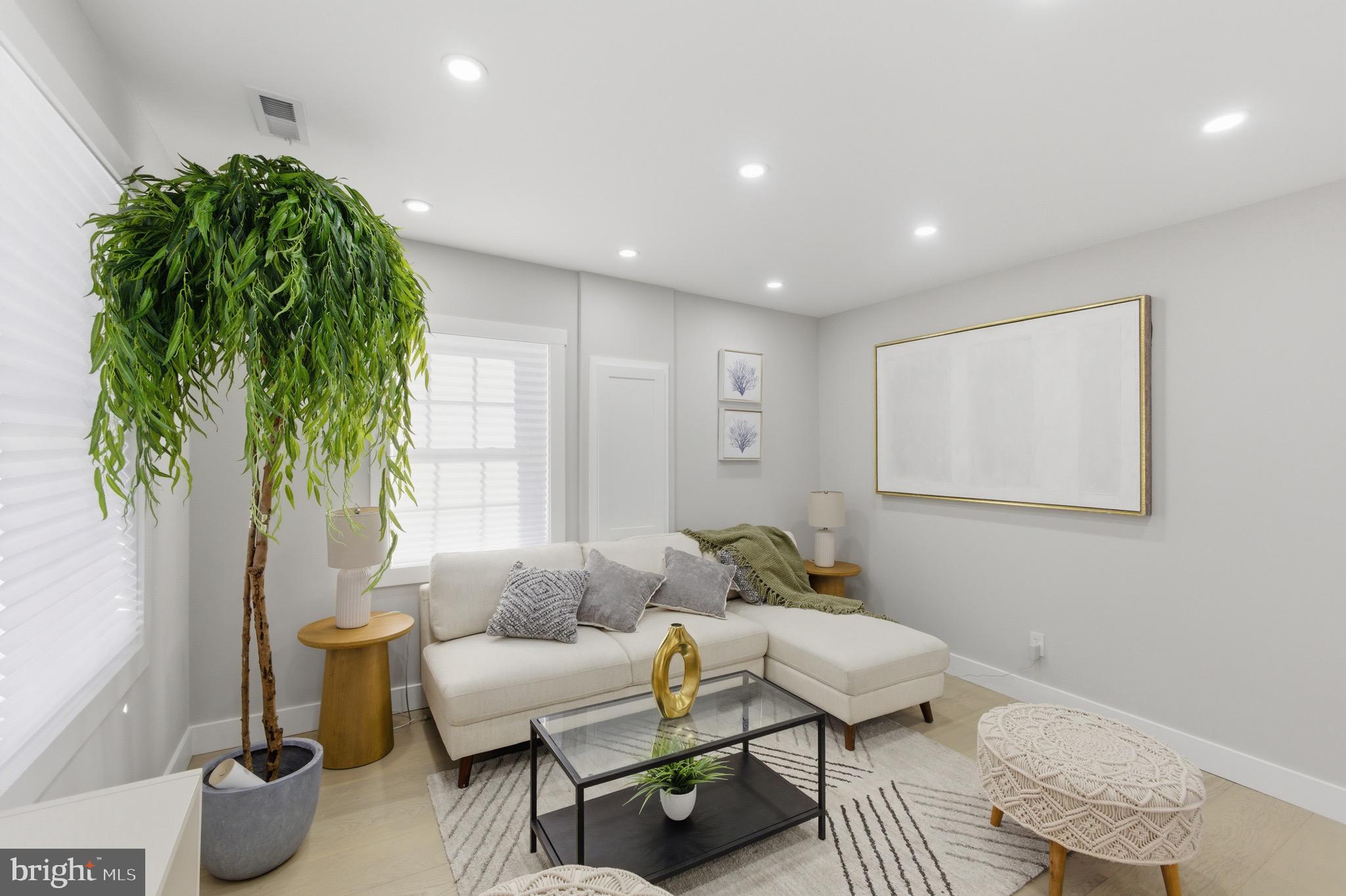 5218 Nick Road Shady Side, MD 20764 - Photo 5 of 24 a living room with furniture and a potted plant