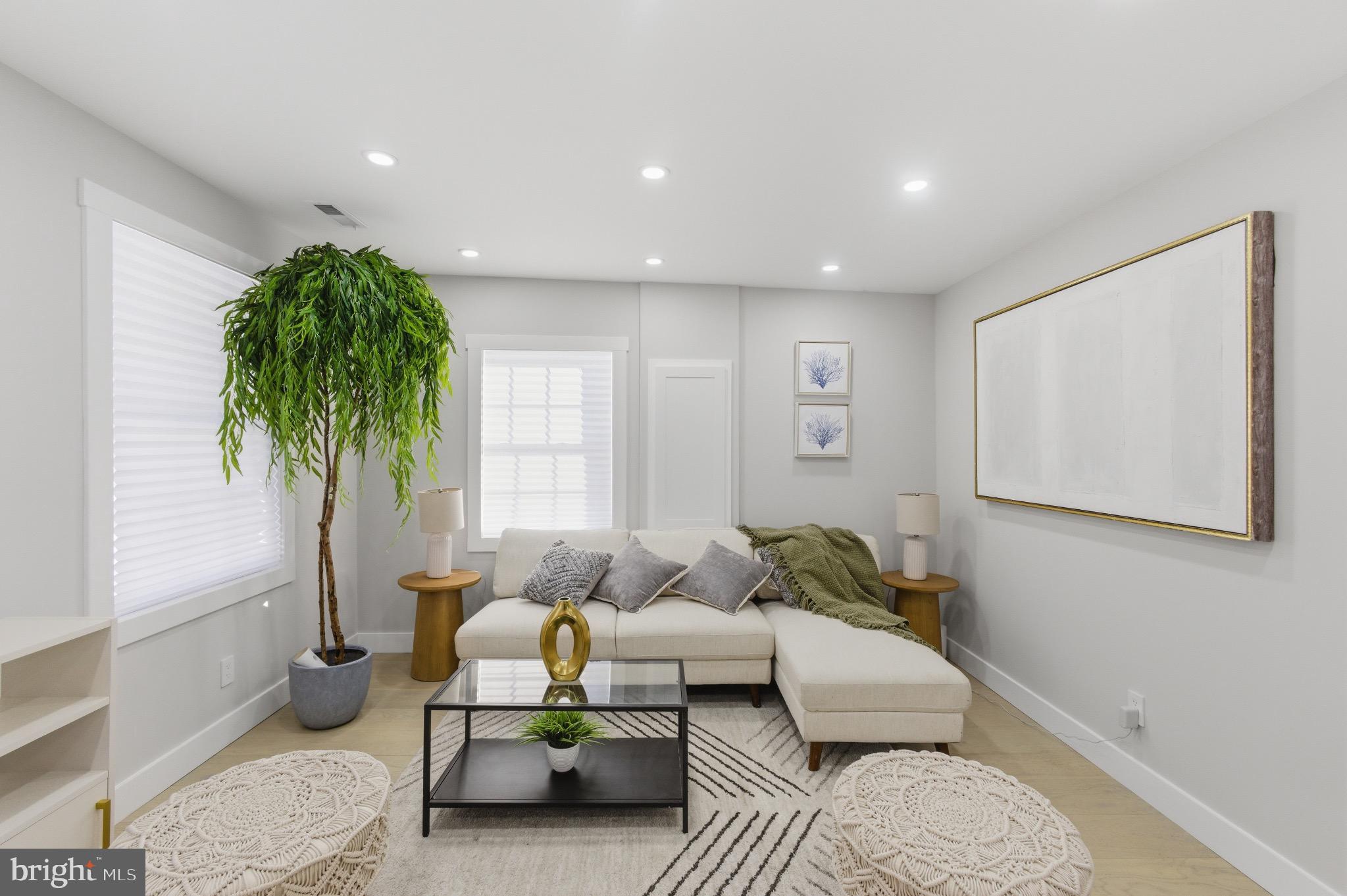 5218 Nick Road Shady Side, MD 20764 - Photo 6 of 24 a living room with furniture and a potted plant