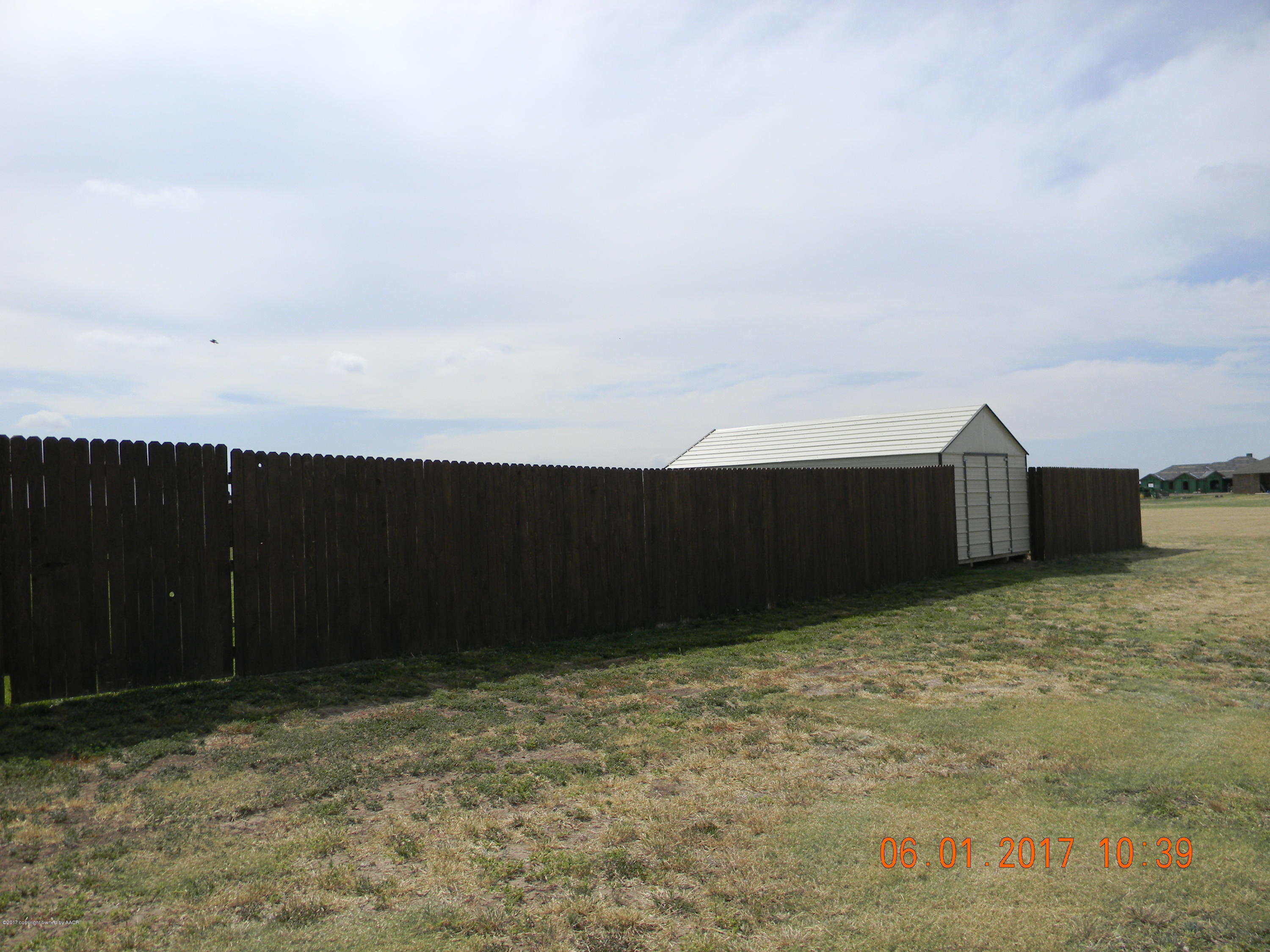 18451 Stone Creek Road Amarillo, TX 79124 - Photo 38 of 38 West Side of Back Yard