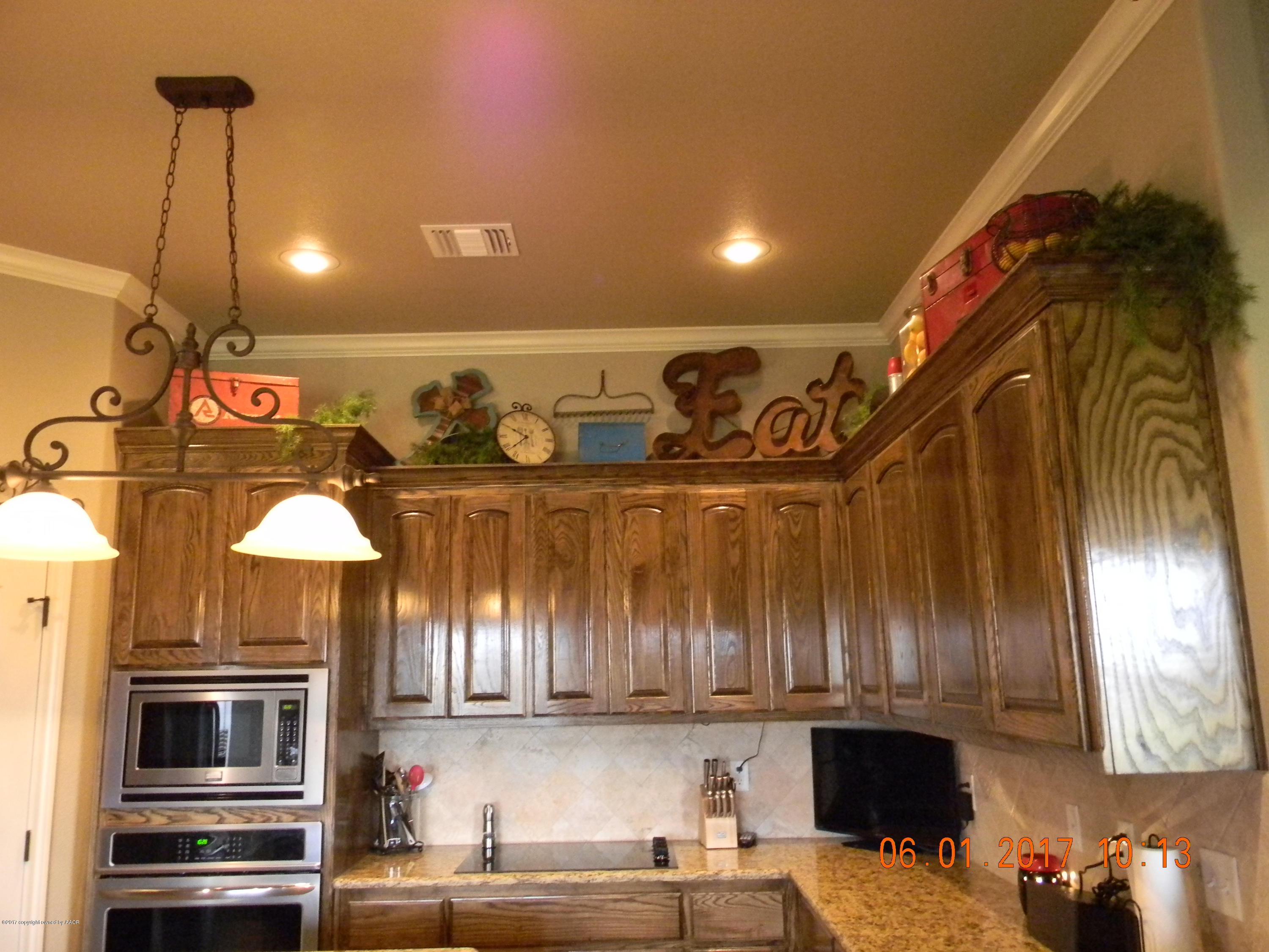 18451 Stone Creek Road Amarillo, TX 79124 - Photo 7 of 38 Kitchen Cabinets