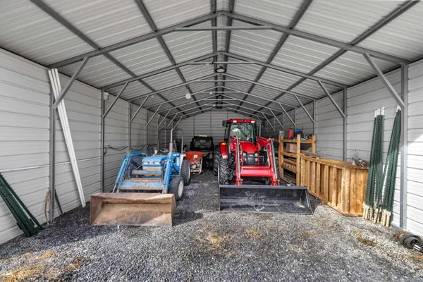 a kitchen with a sink cabinets and window