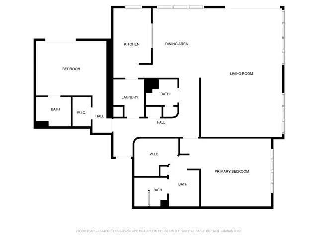 a living room with furniture fireplace and floor to ceiling window