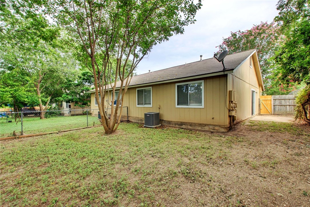 2003 Pipers Field Drive, Unit A Austin, TX 78758 - Photo 25 of 25 a view of a house with a yard
