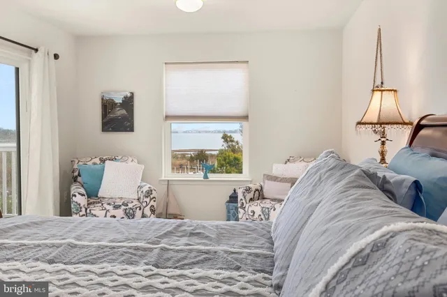 a view of a hallway with seating area