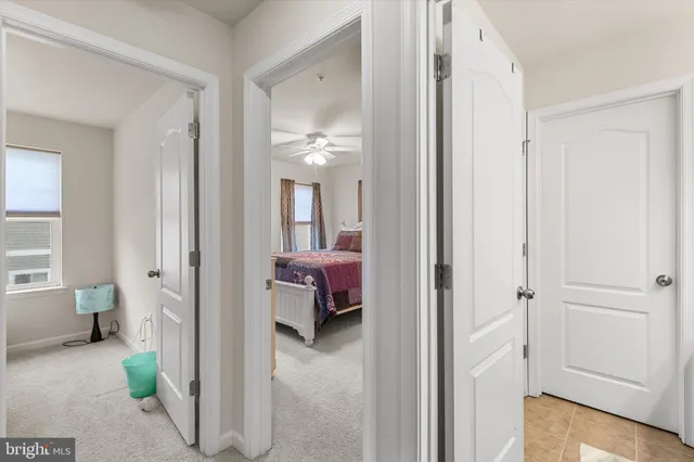 a view of a balcony with chair and wooden floor