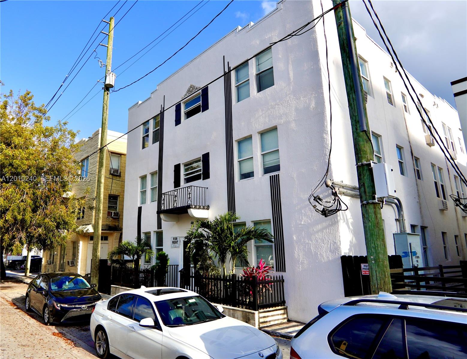 1142 Southwest 4th Street, Unit 17 Miami, FL 33130 - Photo 18 of 20 a cars parked in front of a building