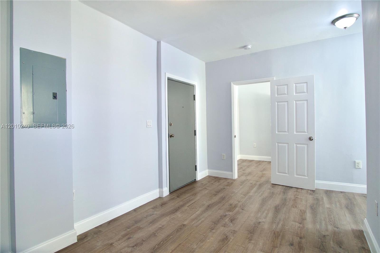 1142 Southwest 4th Street, Unit 17 Miami, FL 33130 - Photo 2 of 20 wooden floor in an empty room